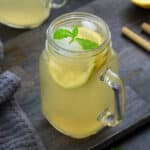 Homemade Lemonade in a serving glass mug.