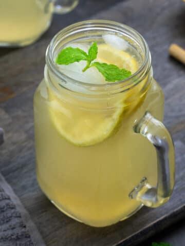 Homemade Lemonade in a serving glass mug.