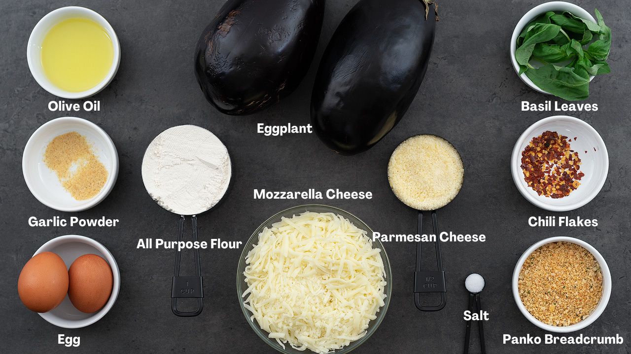 Eggplant Parmesan Ingredients placed on a gray table