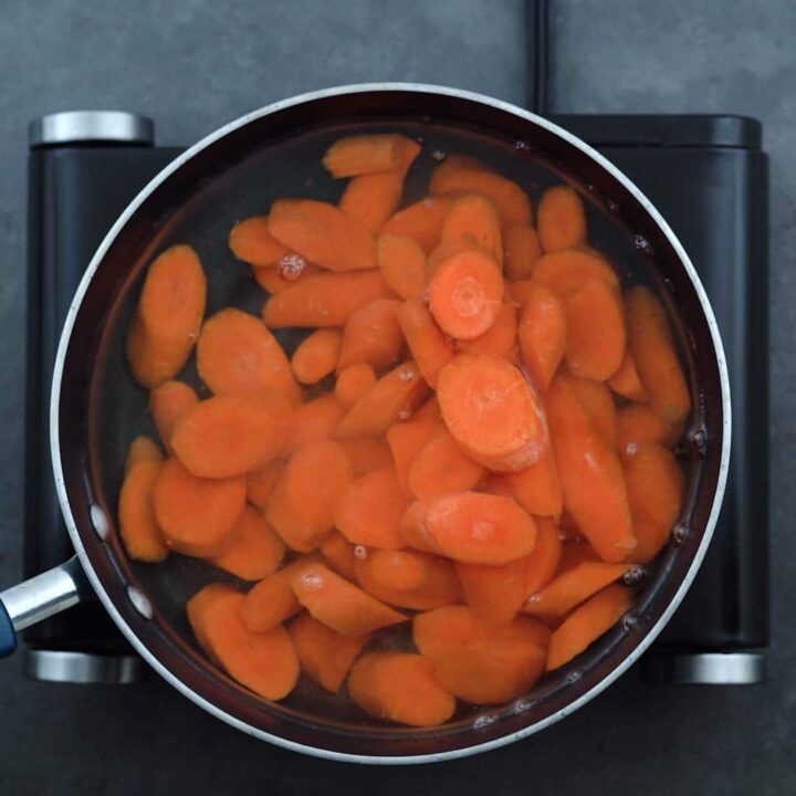 Carrots are cooking in a pan