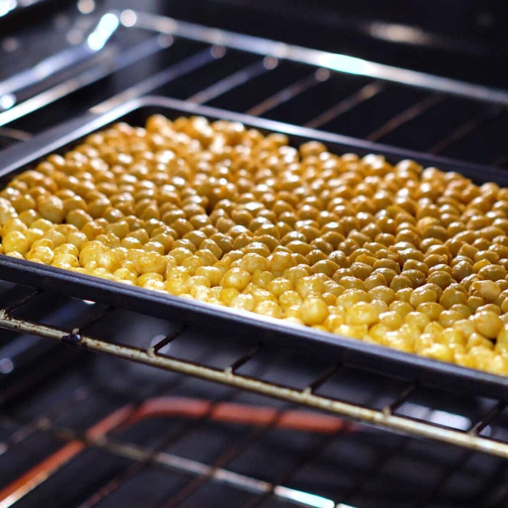 Chickpeas roasting in an oven