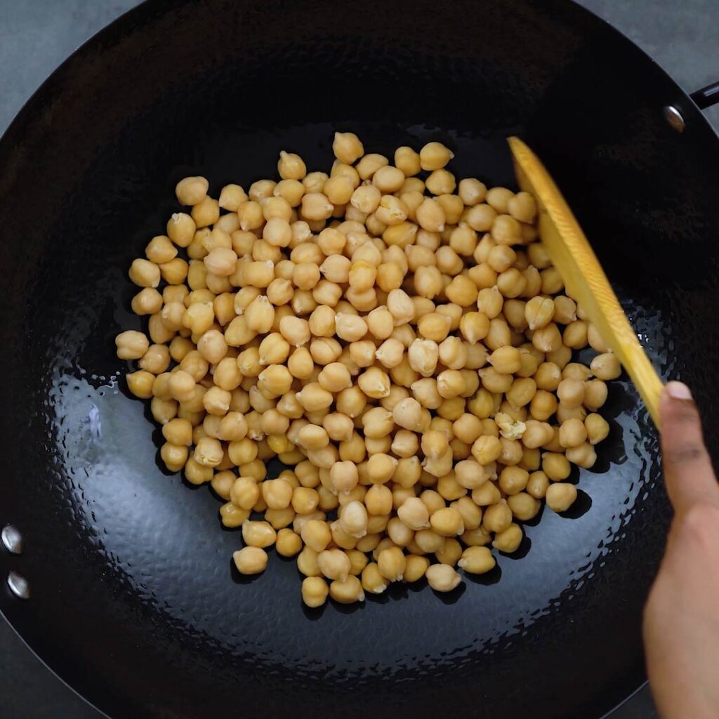 Pan roasting the cooked chickpeas