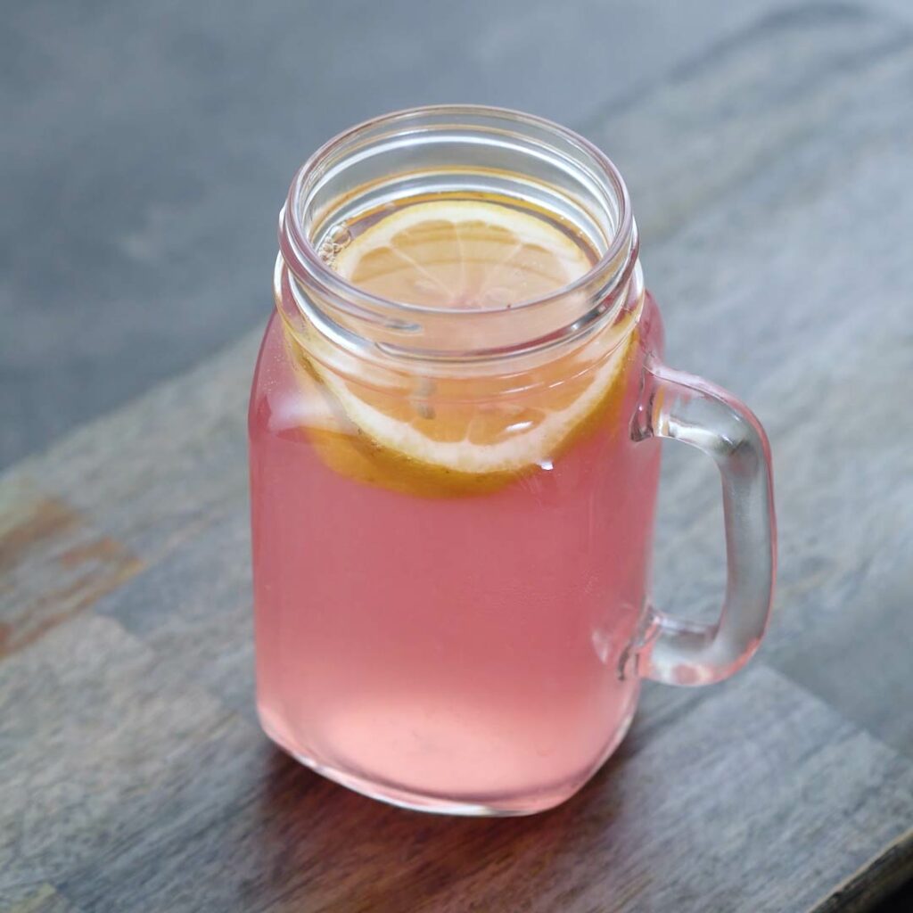 Pink Lemonade served in a serving mug.