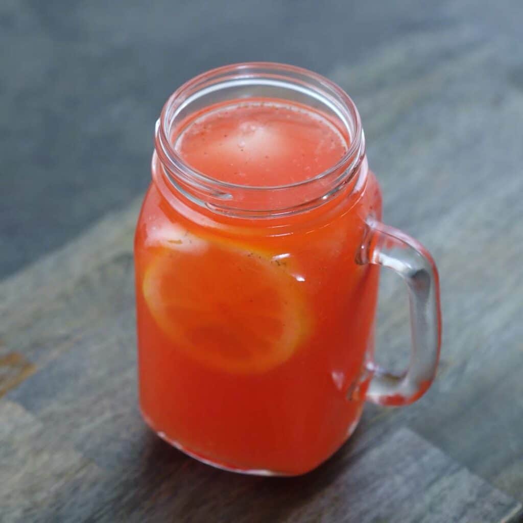 Strawberry Lemonade served in a serving mug.