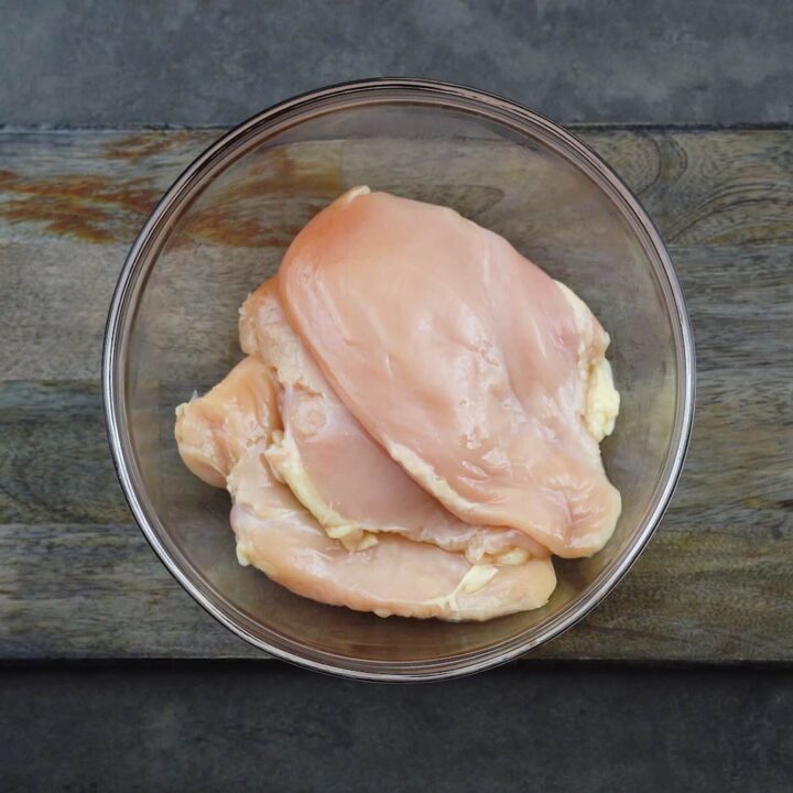Pounded chicken breast in a bowl
