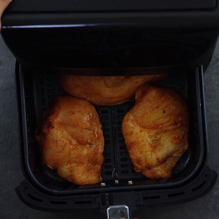 Chicken breast in the air fryer basket