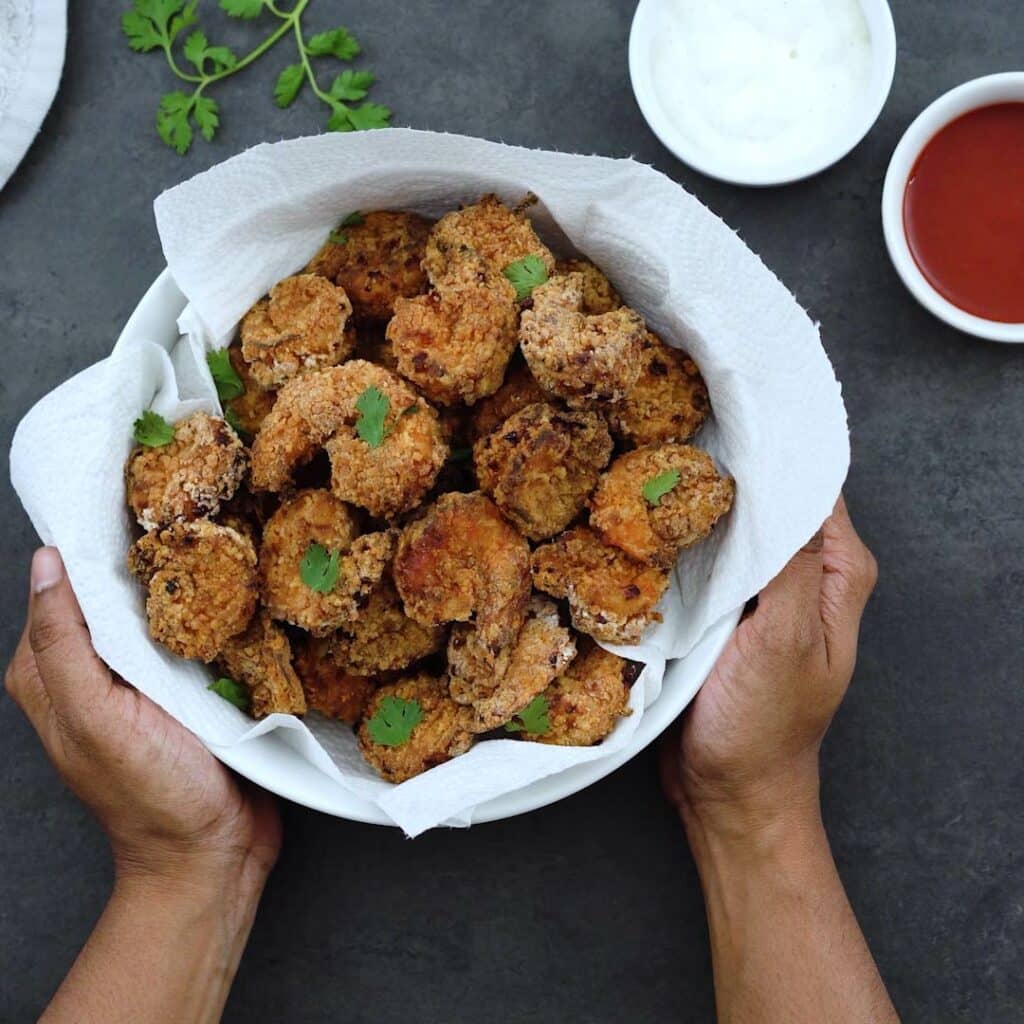 Serving Air Fried Shrimp in a white bowl with sauce alongside