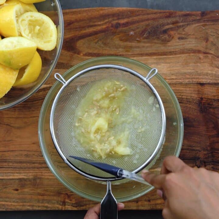 Extracting the juice from the pulp.