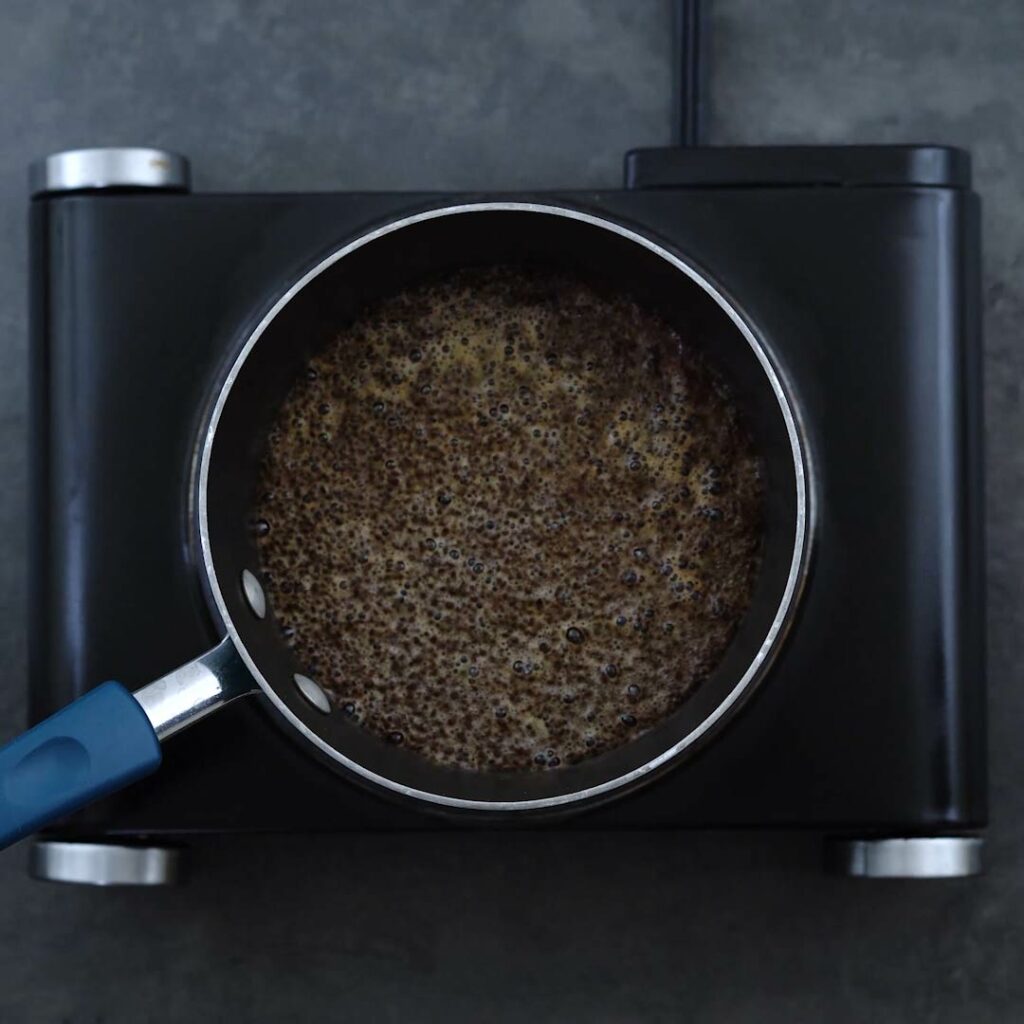 Tea brewing in a saucepan.