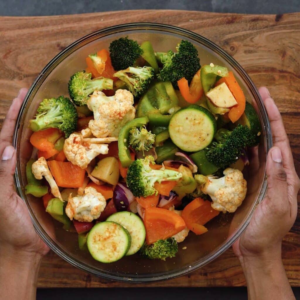 Seasoned veggies in a large bowl