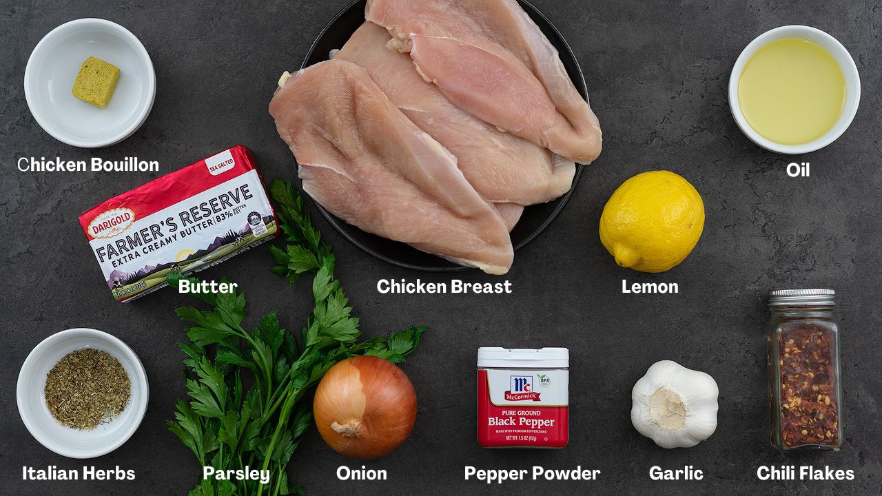 Lemon chicken recipe ingredients placed on a grey table.