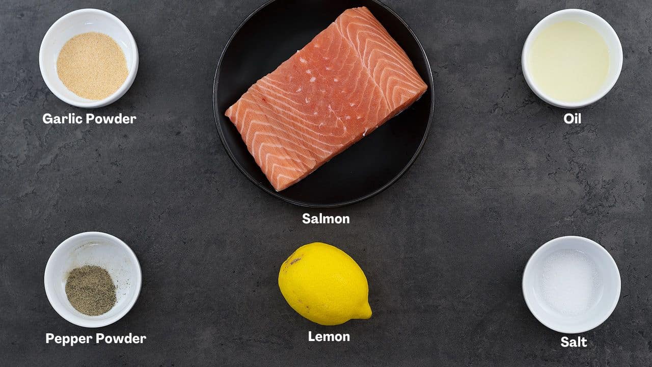 Pan Fried Salmon recipe ingredients placed on a grey table.