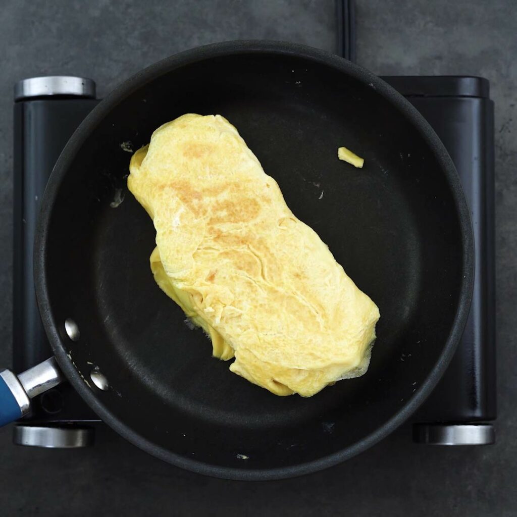 Rolled Egg Omelette in a pan.
