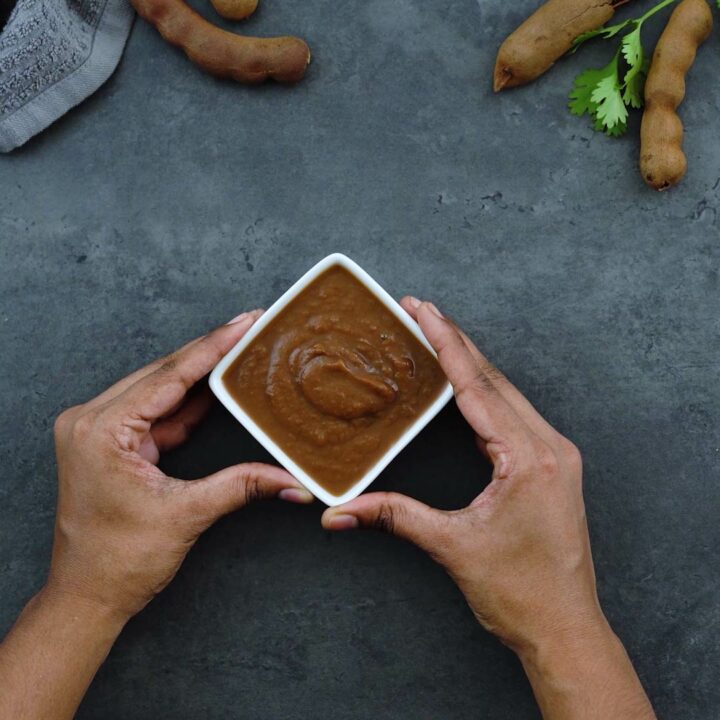 Serving Tamarind Paste in a white square bowl.