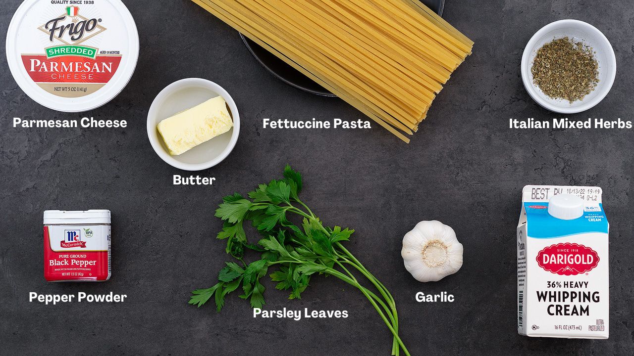 Fettuccine Alfredo Pasta recipe Ingredients placed on a grey table.