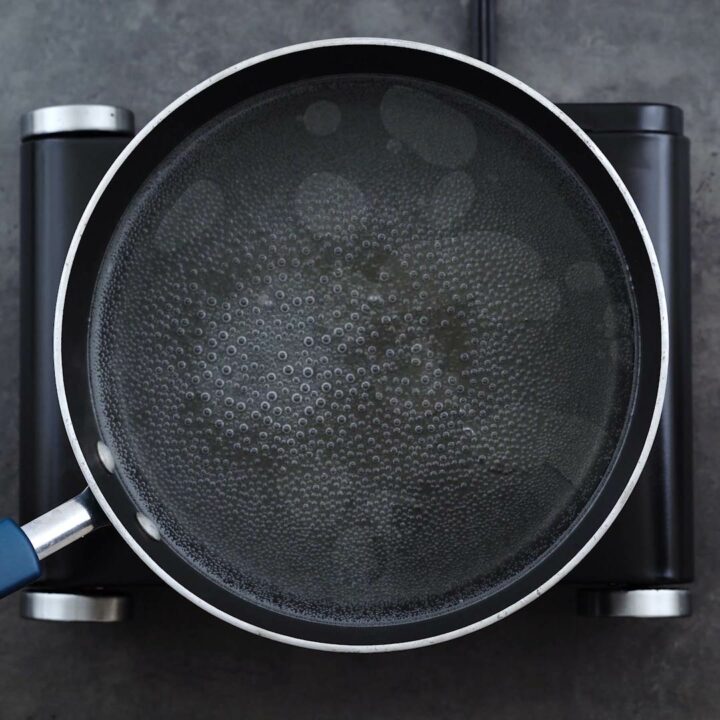 Water boiling in a pan.