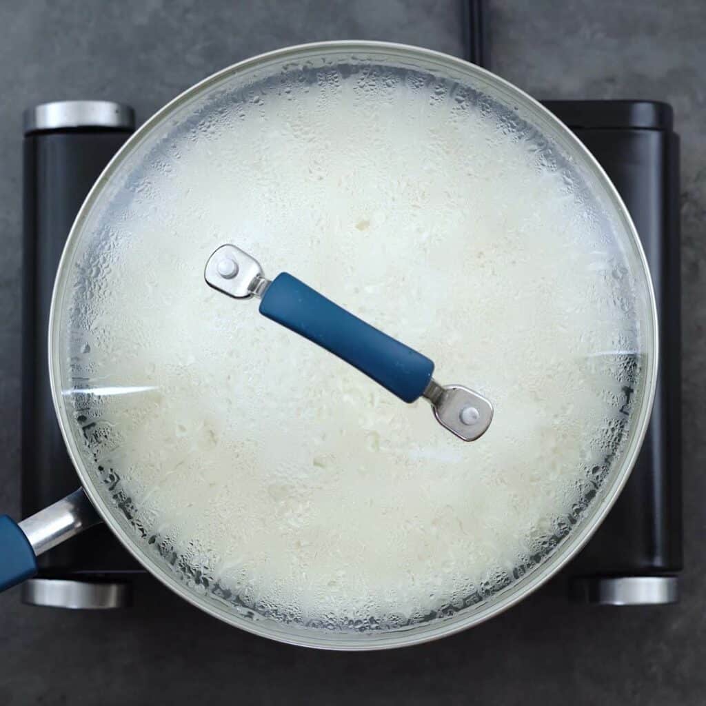 Basmati Rice cooking in low heat with lid closed.