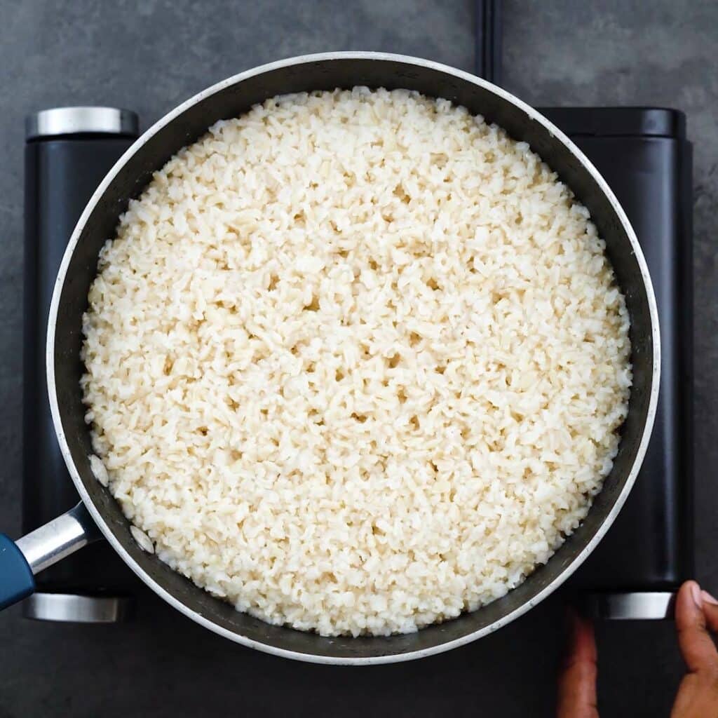 Switching the heat off to rest the brown rice.