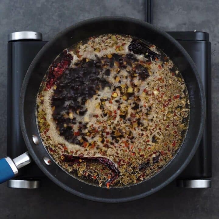 Sauce mixture boiling in a pan.