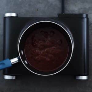Chili Sauce boiling in a saucepan.