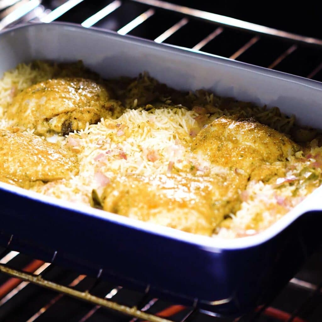 Chicken and rice baking in oven without foil.