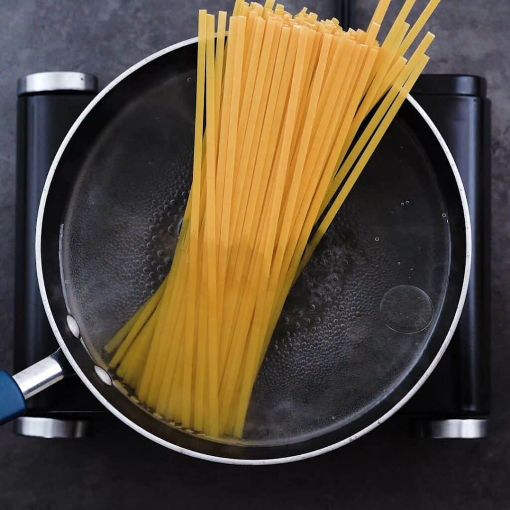 Fettuccine Pasta in a boiling water.