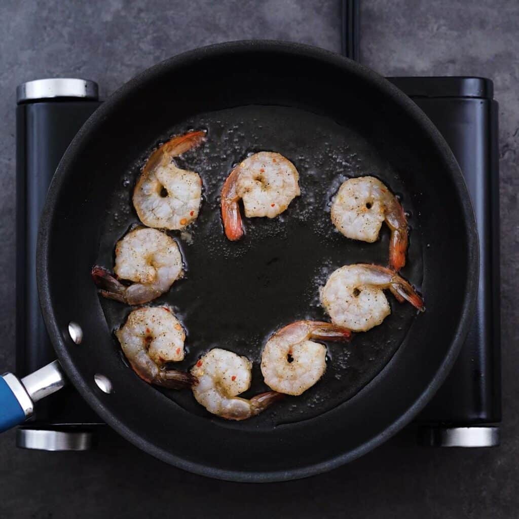 Shrimp frying in the frying pan.