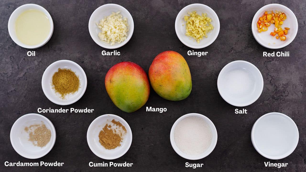Mango Chutney recipe Ingredients arranged on a grey table.