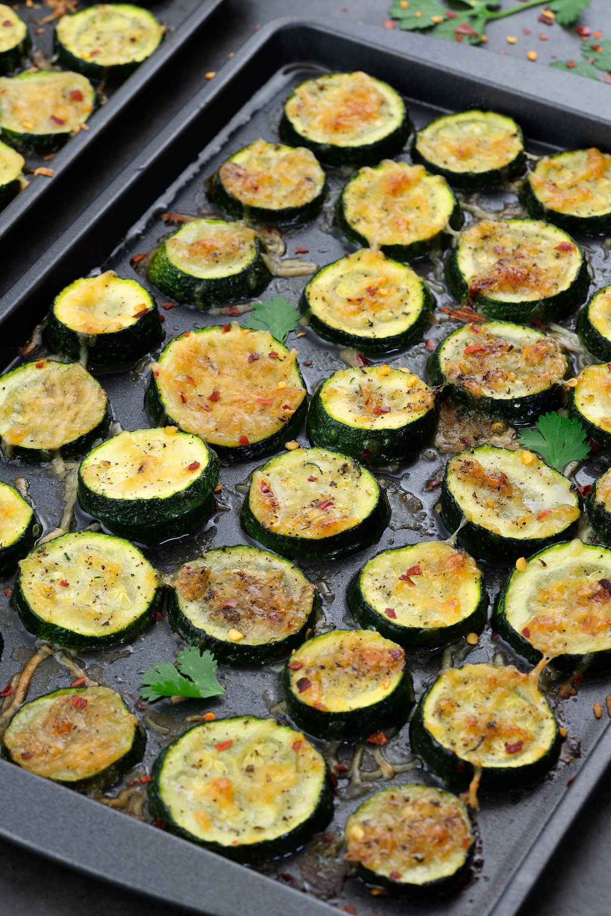 Roasted Zucchini in a baking tray.