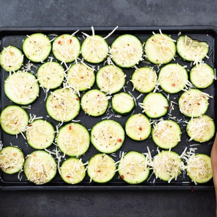 Seasoned Zucchini placed in a baking tray.