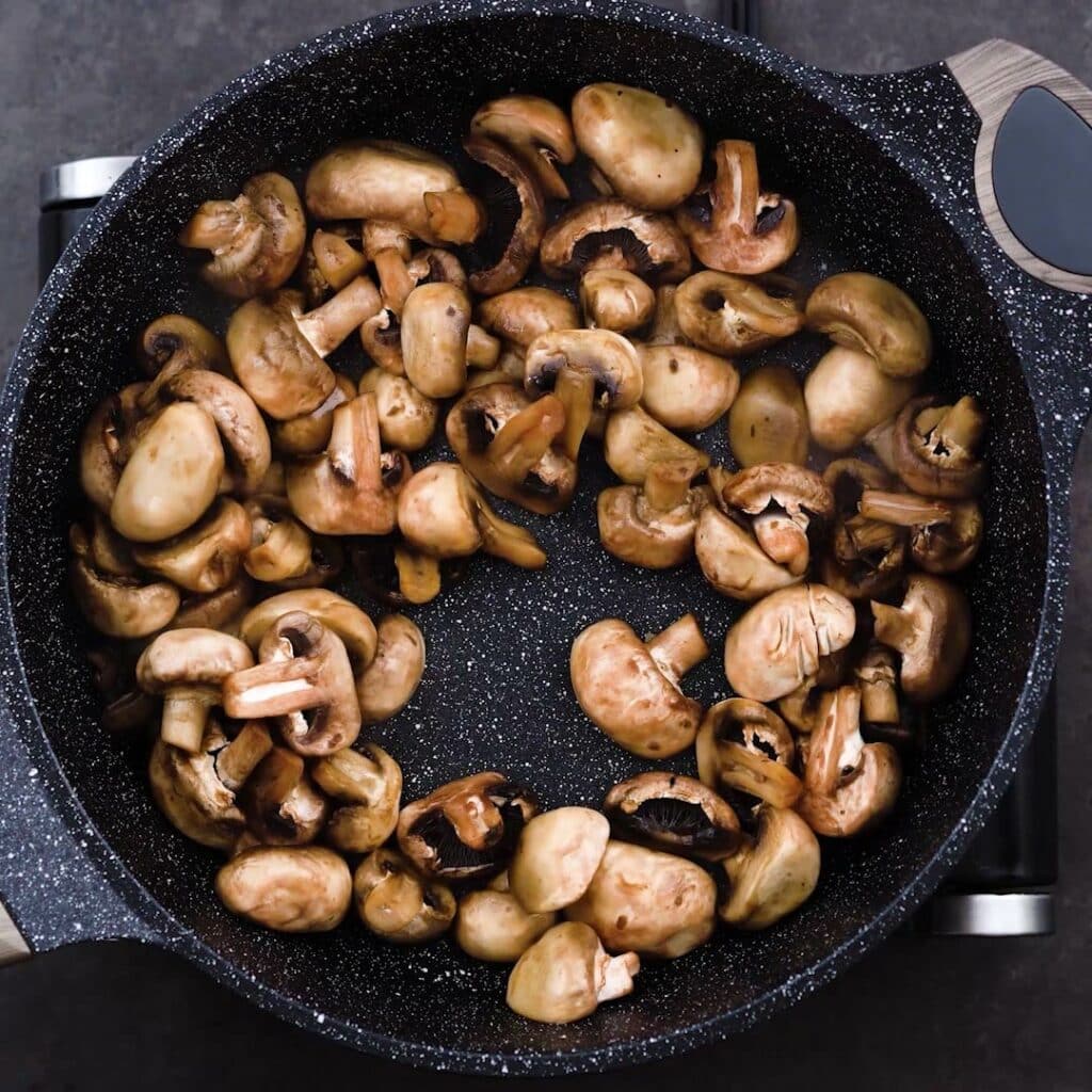 A pan filled with mushroom.