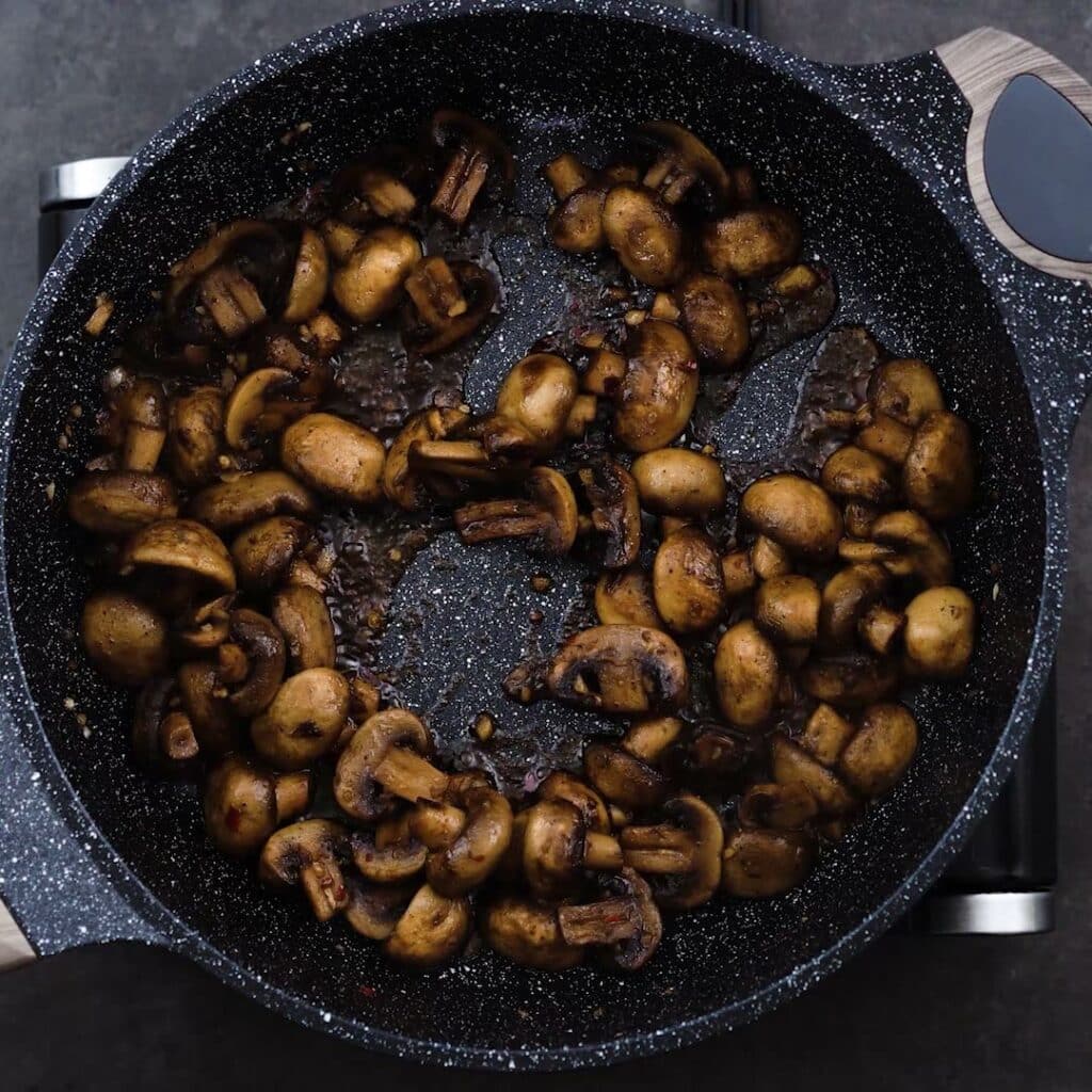 Sauteed Mushroom in a pan.