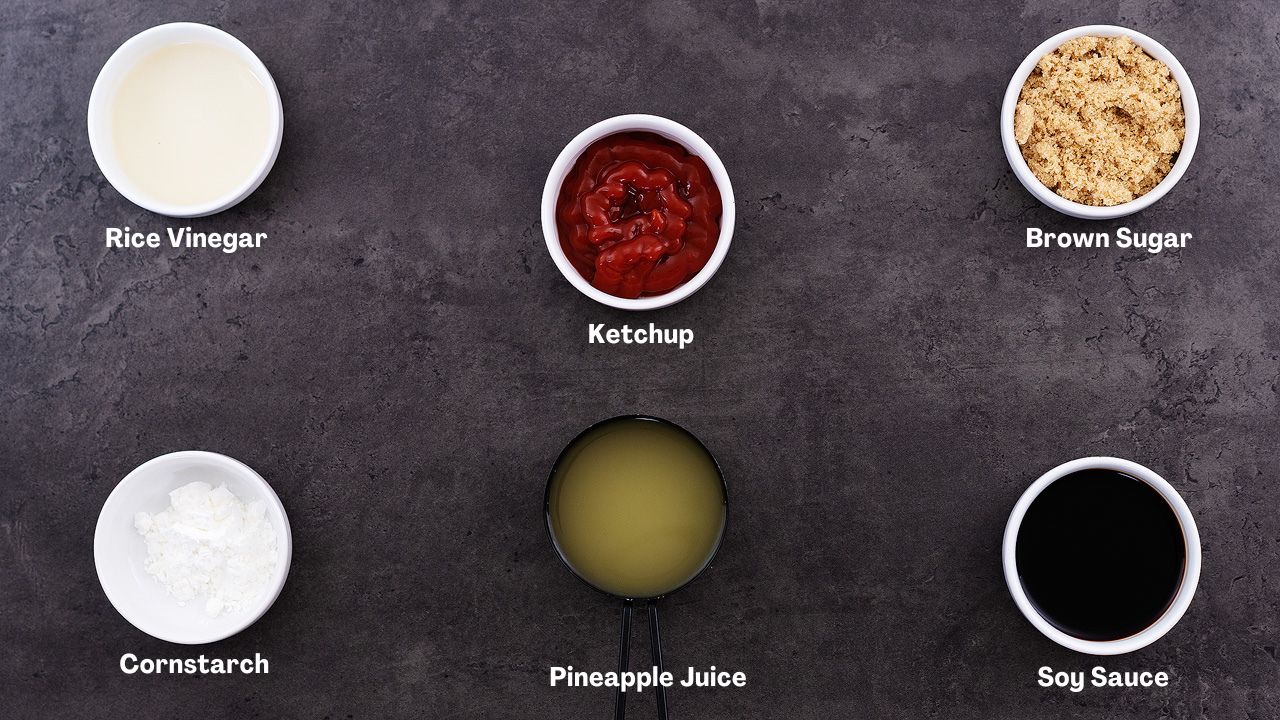 Sweet and sour sauce ingredients arranged on a grey table.