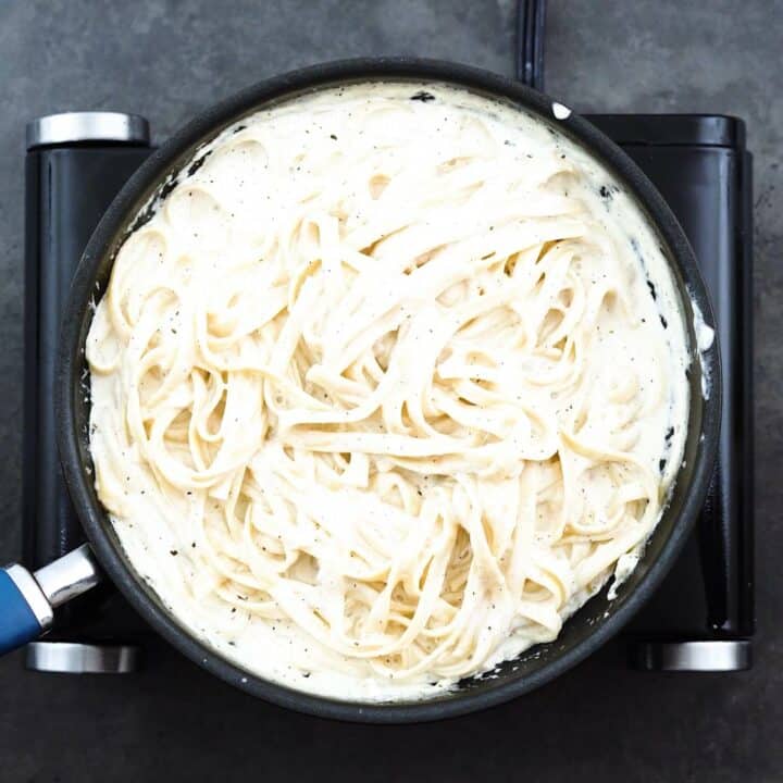 A pan with fettuccine alfredo pasta.