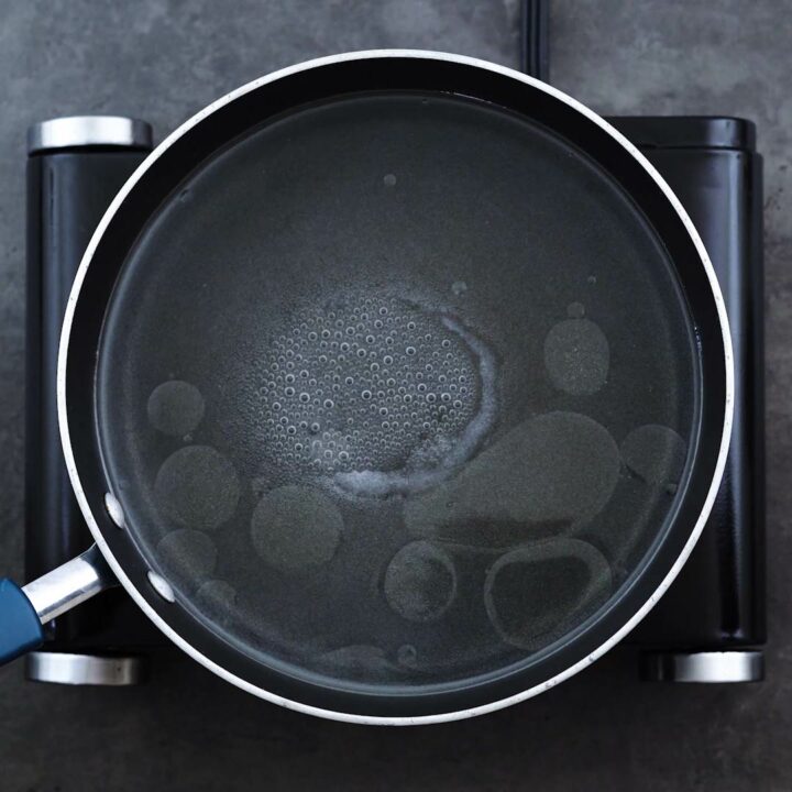 Water boiling in a wide pot.
