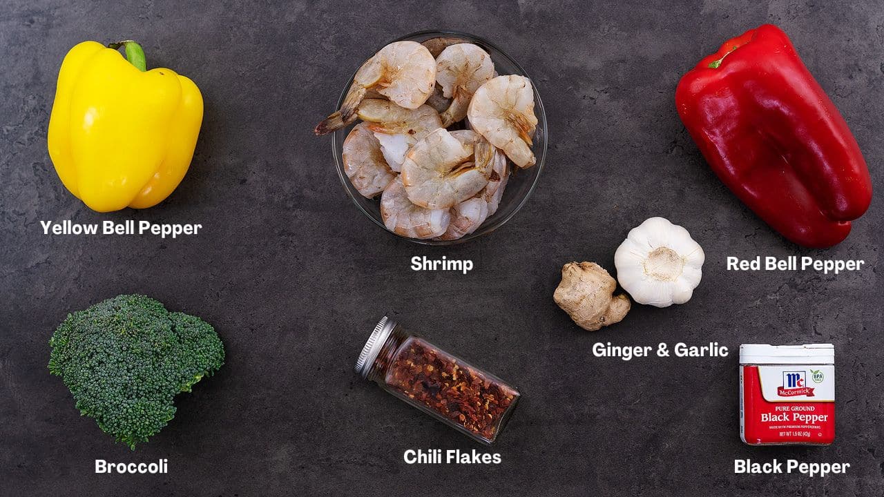 Shrimp Stir Fry recipe Ingredients arranged on a grey table.