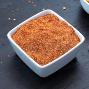 Taco Seasoning in a white square cup.