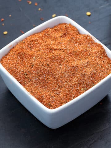 Taco Seasoning in a white square cup.