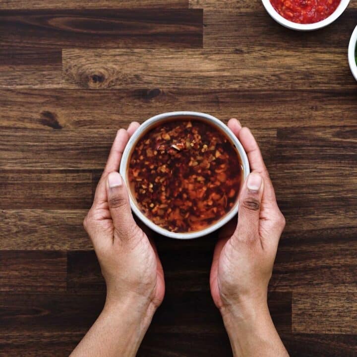 Serving Chinese Chili Oil in a white bowl.