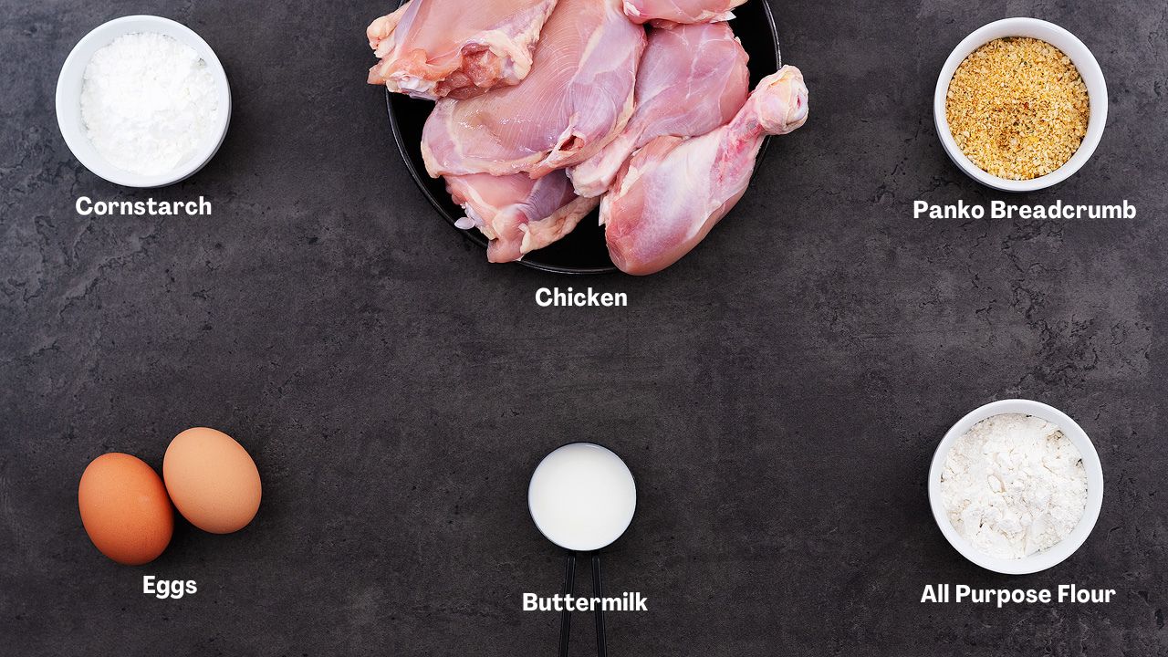 Oven-Fried Chicken recipe Ingredients placed on a grey table.