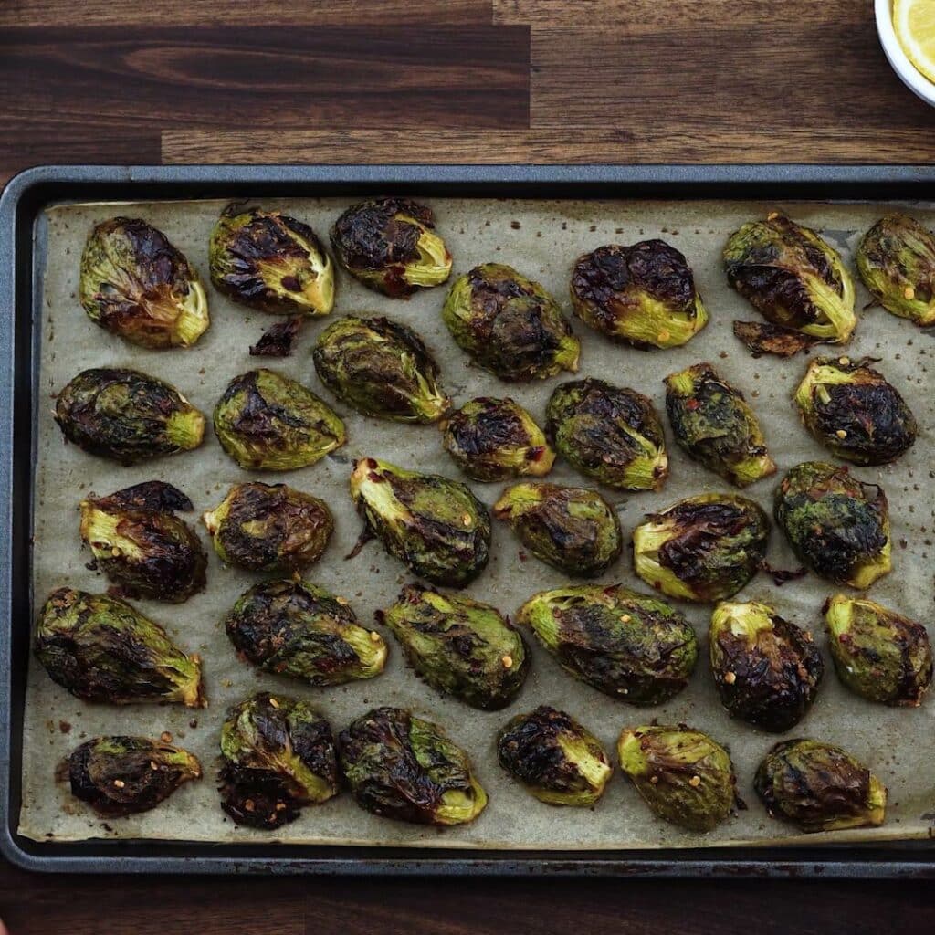 Oven Roasted Brussels Sprouts in a baking tray.
