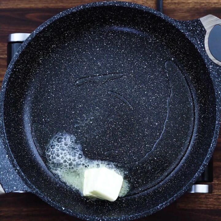 A pan with butter melting.