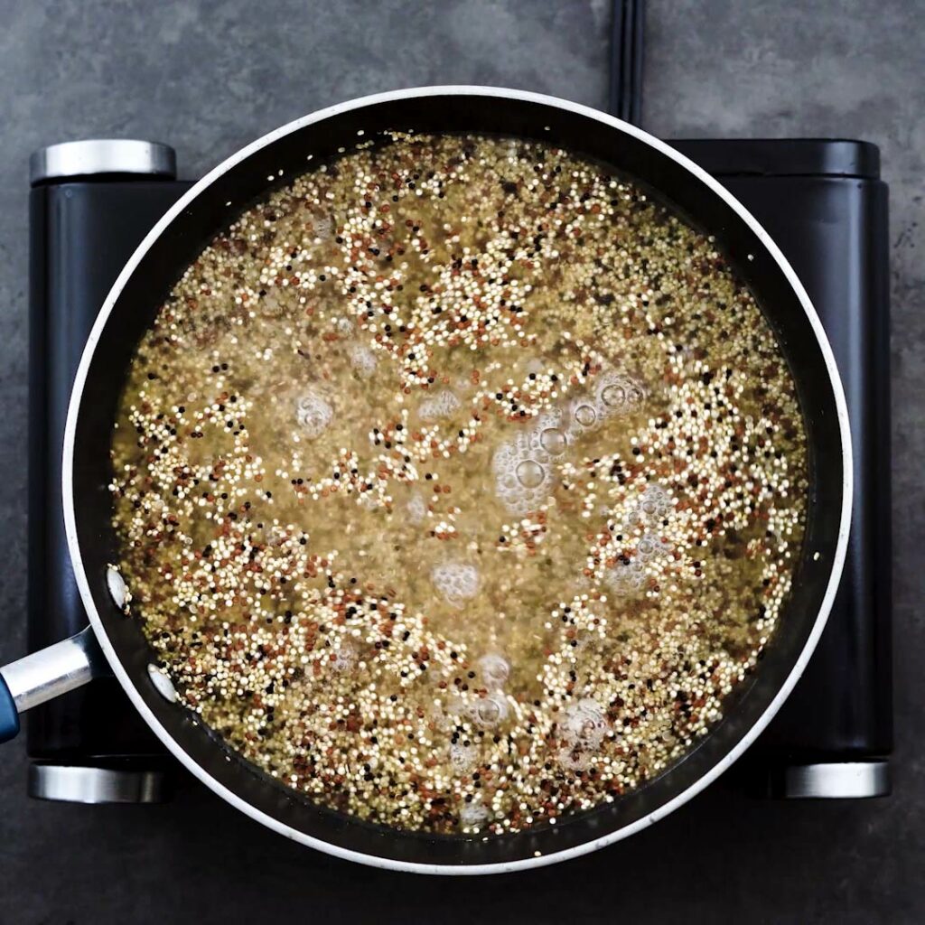 A pan with quinoa and water.