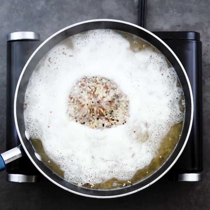 A pan with boiling quinoa.