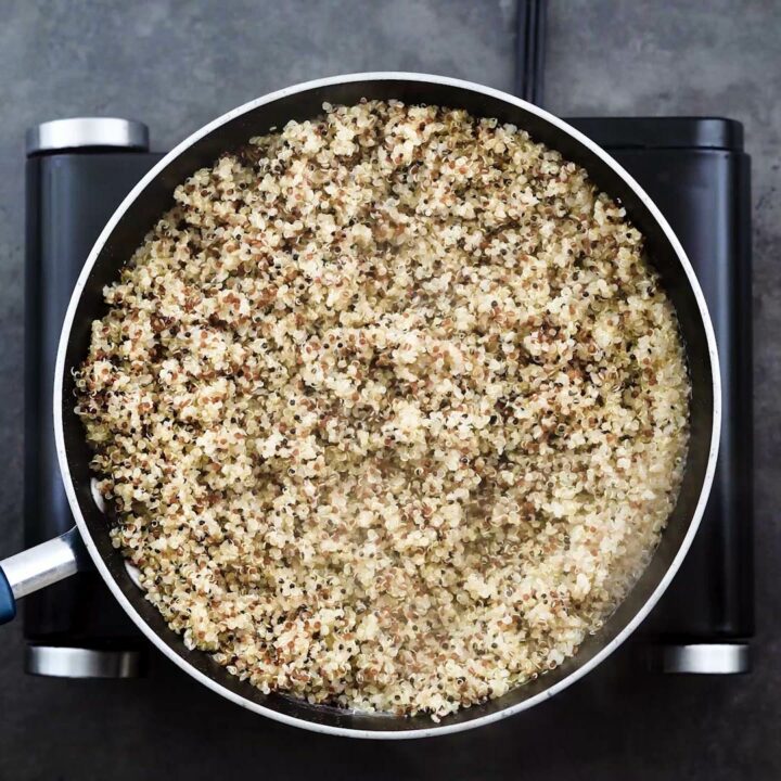 Perfectly cooked quinoa in a pan.