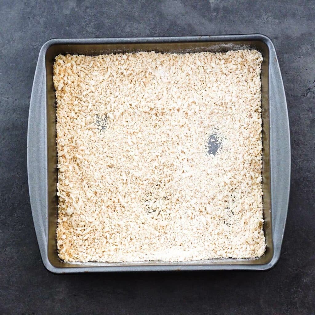 A shallow tray with breading mixture.