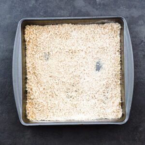A shallow tray with breading mixture.