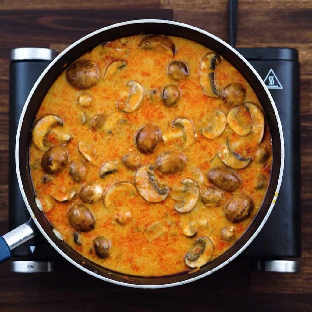 Chicken, mushroom in a broth coconut milk mixture.