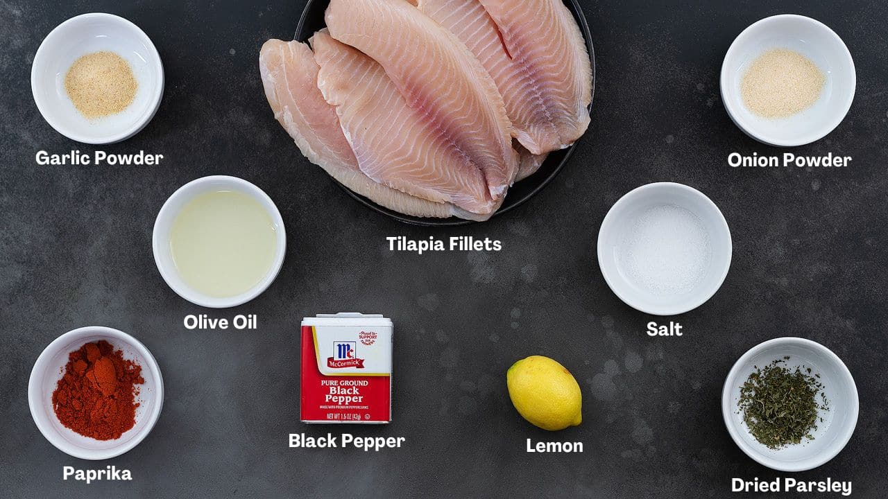 Oven Baked Tilapia recipe Ingredients placed on a grey table.
