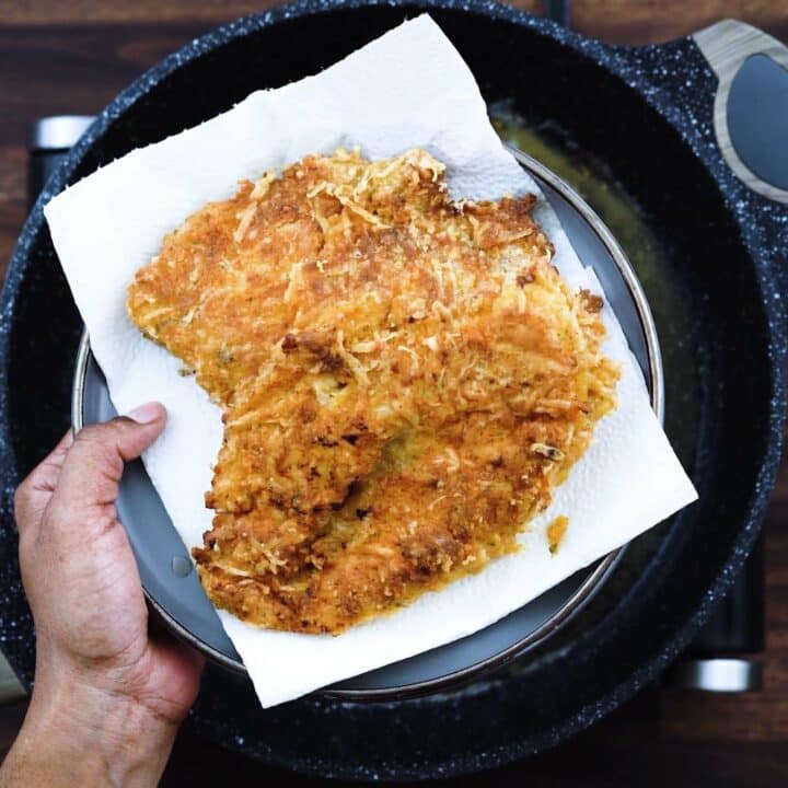 Fried Crispy Parmesan Crusted Chicken on a plate.